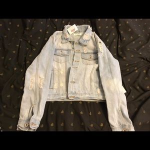 Distressed denim jacket